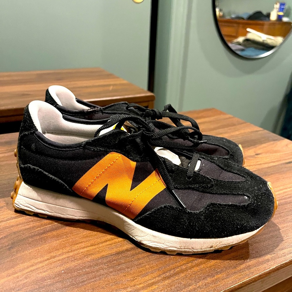 New Balance sneakers. Size 4 1/2 boys or size 6 women.